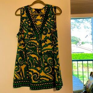 Yellow, green and black top with black beads adorning v-neck